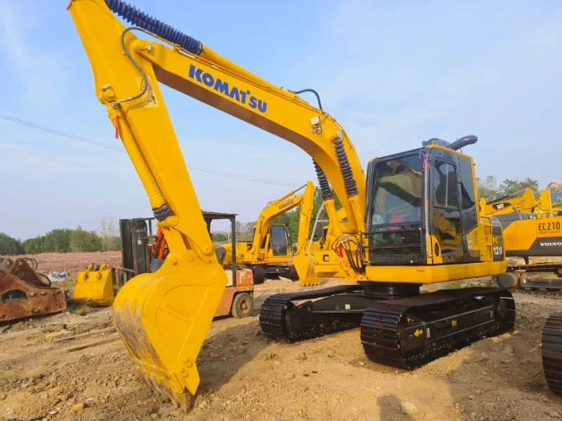 Pelle rétro sur chenilles hydraulique Komatsu PC120 d'occasion à vendre – Prix abordable